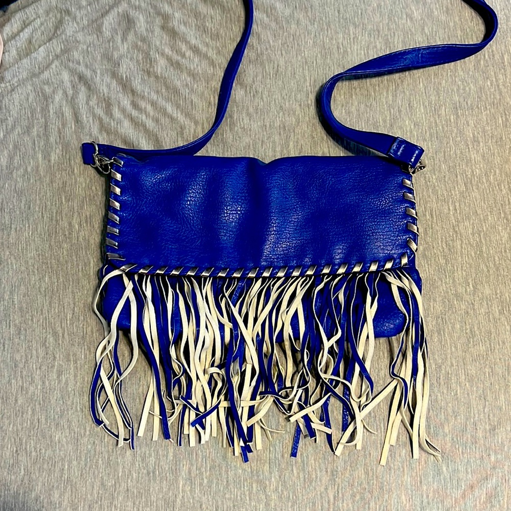 Steve Madden cross body bag blue and white fringe cross body purse. Used